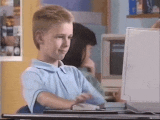 That cool kid who's using an old PC who looks up from his monitor and gives a sweet thumbs up to the camera